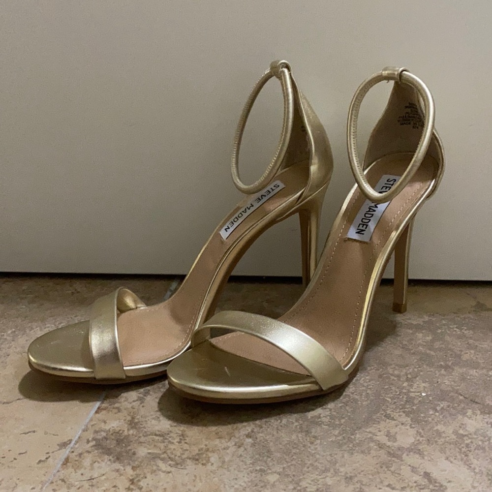Gold Steve Madden heels.